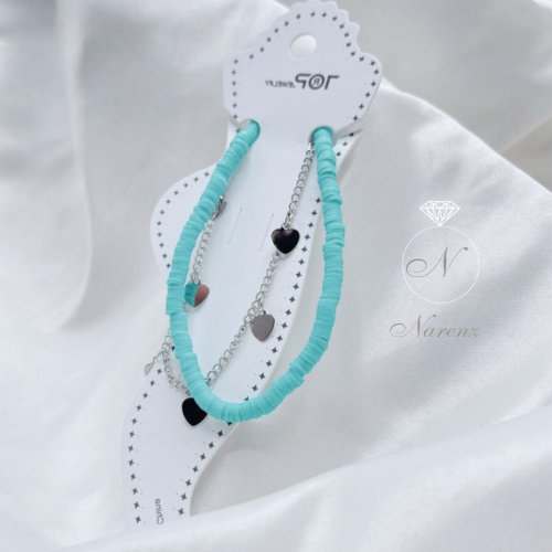 خلخال مزين بحبات من الخرز بلون تفاني يتكون من سلسل...