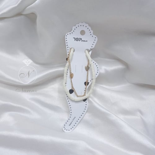 خلخال مزين بحبات من الخرز الأبيض يتكون من سلسلة رف...