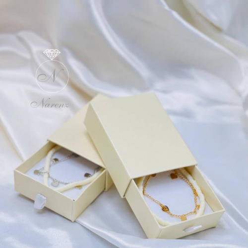 خلخال مزين بحبات من الخرز الأبيض يتكون من سلسلة رف...