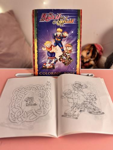 Previous and upcoming coloring book with activitie...