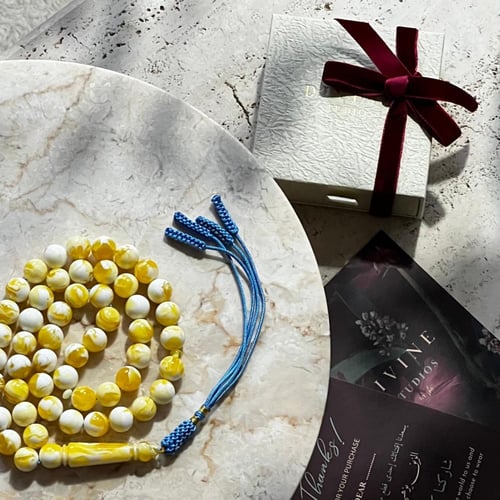 سبحة بكلايت اصفر مموج كركوشة نيلي