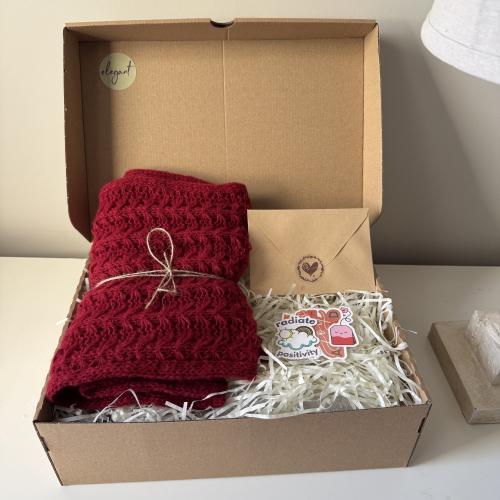 The gift of the red shawl with a message and a set of stickers
