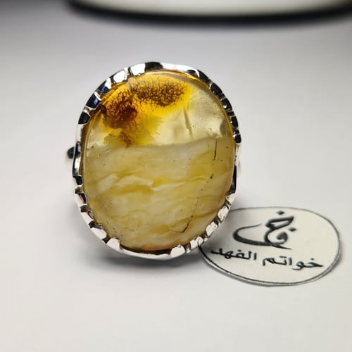 خاتم فضه نادر بحجر كهرمان بولندي طبيعي شفاف ومشخط...