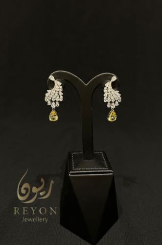 حلق فضه مرصع بالزركون السويسري لون ابيض واصفر