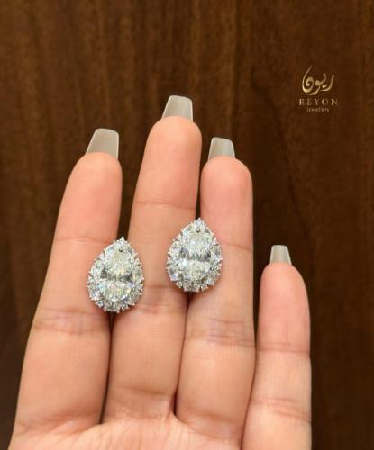 حلق فضه مرصع بالزركن السويسري تصميم الماس