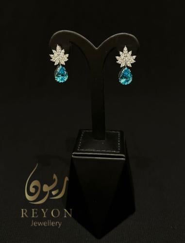 حلق فضه مرصع بالزركون السويسري لون ابيض وسماوي