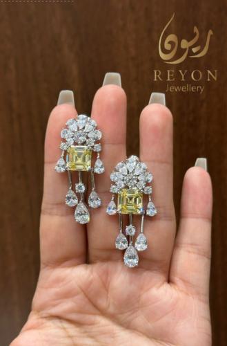 حلق فضه مرصع بالزركون السويسري لون ابيض واصفر