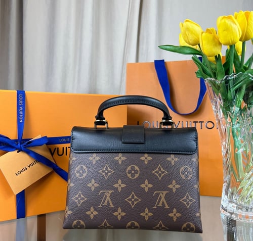 لويس فيتونا Louise Vuitton