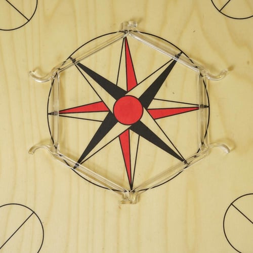 منظم حبوب الكيرم-Carrom Coin Settler