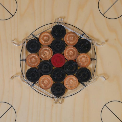 منظم حبوب الكيرم-Carrom Coin Settler