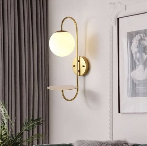 اضاءة جدارية ذهبي