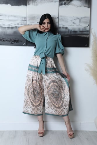 تيور بنطلون مشجر وبلوزه طويله من الخلف