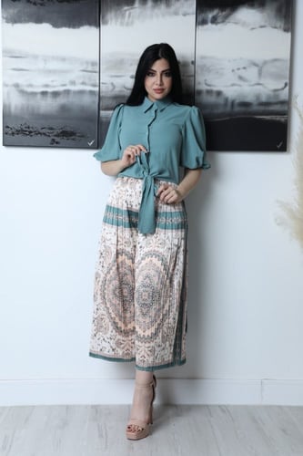 تيور بنطلون مشجر وبلوزه طويله من الخلف