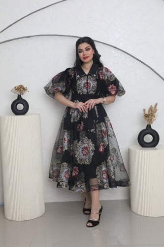 فستان اسود مشجر بياقه شك