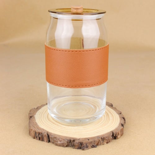 كوب قهوة زجاجي بمسكة جلد مع مصاص زجاجي وغطاء