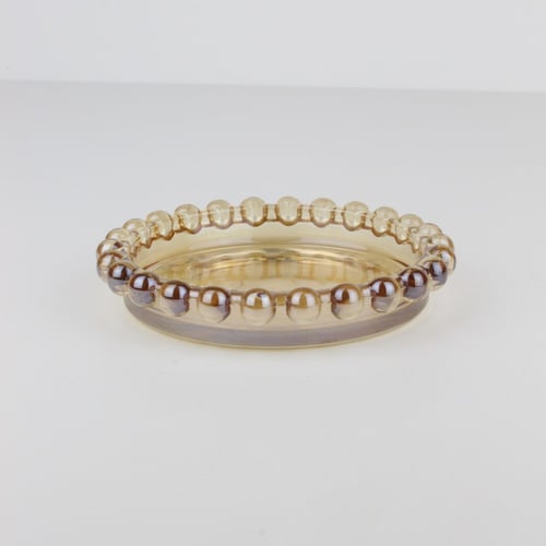 كوستر زجاجي ذهبي