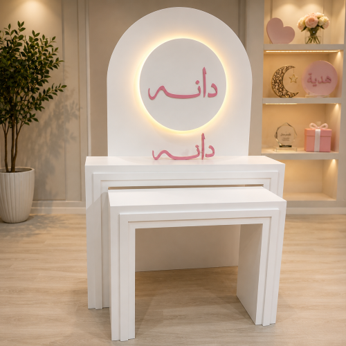 Two entrance tables with custom 3D backdrop and na...