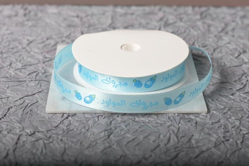 شريطة ساتان سماوي (مبروك المولود )1.2سم20ياردة