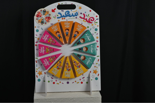 عجلة الحظ بي عبارة (عيد سعيد) فلين مقاس30*50سم