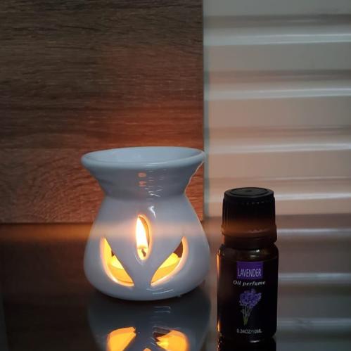 مجموعه(12) فواحة سيرميك مع شمعه