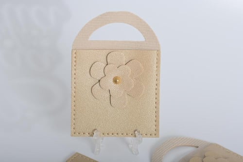 مجموعه (12) جيوب جلد مع ورده بيد لون ذهبي