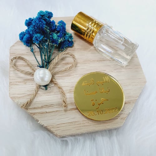 مجموعة (12) تولة عطر مسك بقاعدة ورد مع التنسيق ولو...