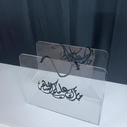 شنطة اكريلك مع حبل وعبارة م 30*24*12سم مع اختيار ل...