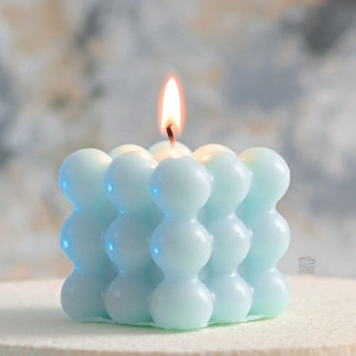مجموعة (12) شموع بابلز لون سماوي