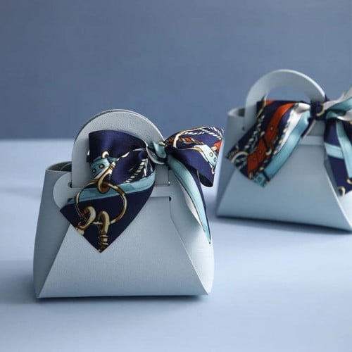 مجموعة (12) شنطة جلد للتوزيعات