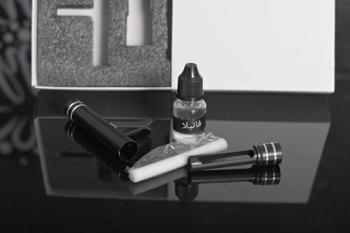 مجموعه (12) فواحات سيارة بروائح متعددة لون اسود