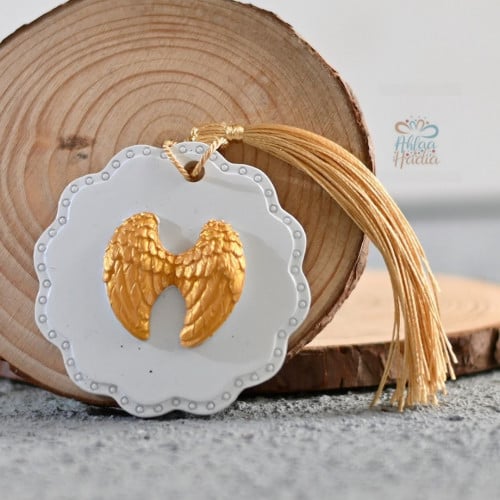 مجموعة (12) حجر بصمة بشكل جناح اللون ذهبي