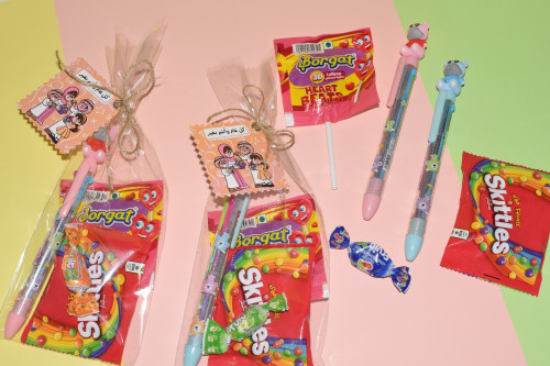 توزيعات أقلام مع حلاوة