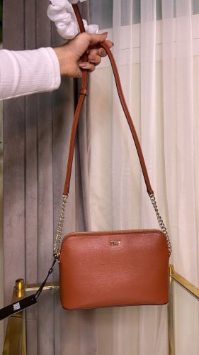 شنطه جملي من دكني DKNY