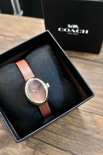 ساعه جلد من كوتش