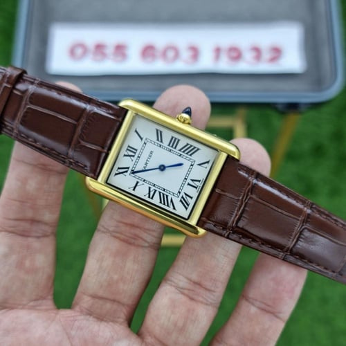 ساعة كارتير تانك موست جلد بني إطار ذهبي