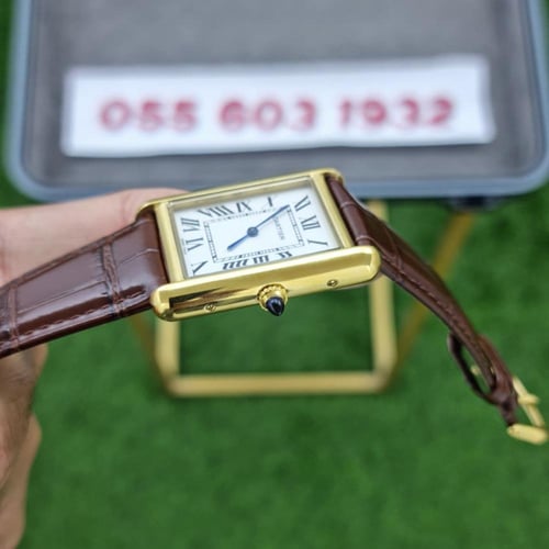 ساعة كارتير تانك موست جلد بني إطار ذهبي