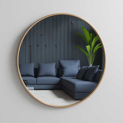 مراية دائرية كبيرة تعلق على الحائط بإطار ذهبي