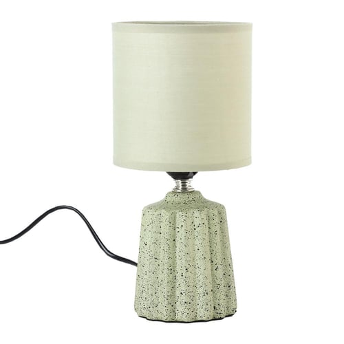 أباجورة طاولة أنيقة مع إضاءة خافتة