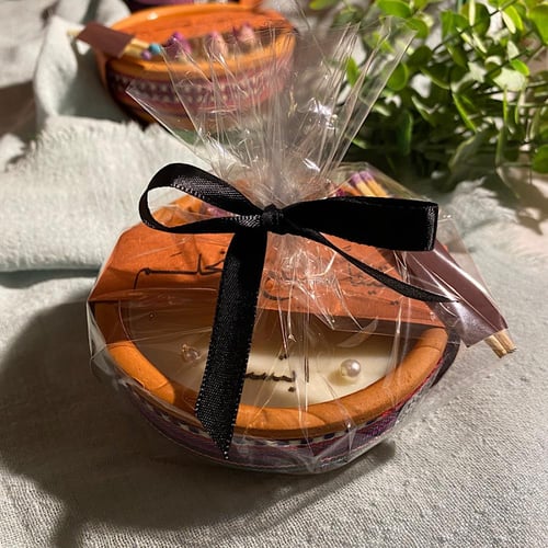 شمعة ورود مع تاق بعبارة