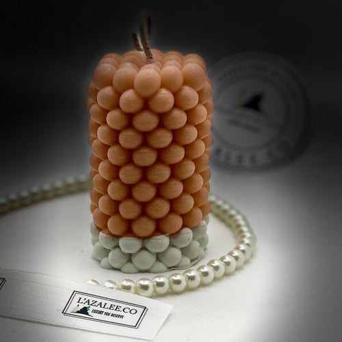 شمعة الببلز الطويلة لون أورانج برائحة كوكو شانيل