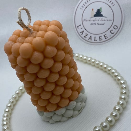 شمعة الببلز الطويلة لون أورانج برائحة كوكو شانيل