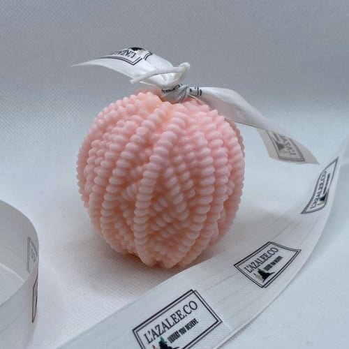 شمعة كرة الصوف وردي