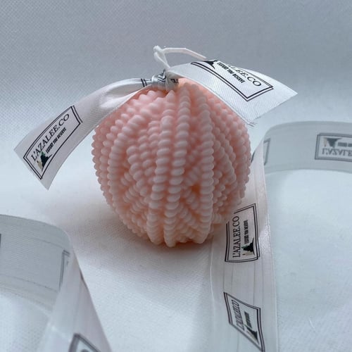 شمعة كرة الصوف وردي