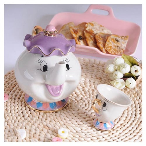 إبريق شاي أنيق مع كوب مسز بوتس