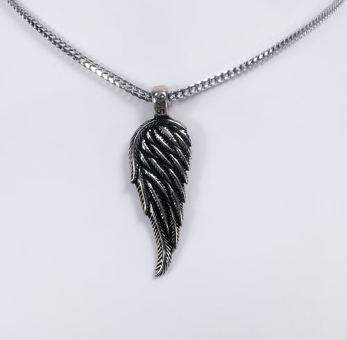 Wing oxidized silver pendant