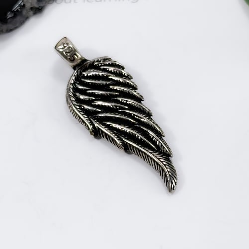 Wing oxidized silver pendant
