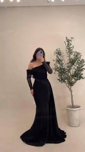 فستان ‏سهرة ‏اللون أسود مع قماش باربي مطرز