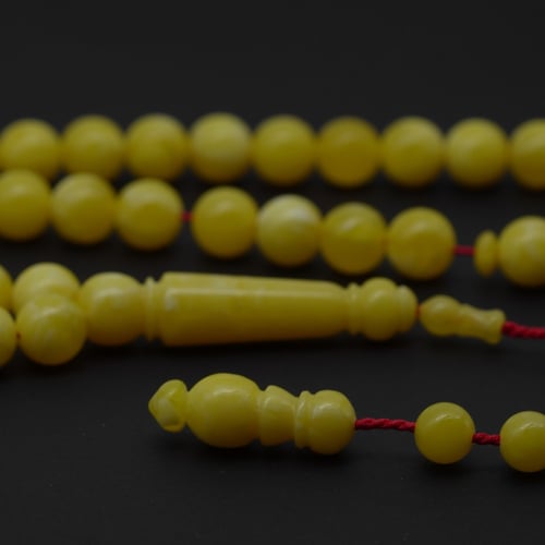 سبحة بكلايت 10 mm بتمليكة لون اصفر فاتح