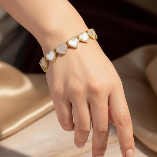 سوار ذهبي على شكل قلوب مع عرق اللؤلؤ – فخامة رومان...