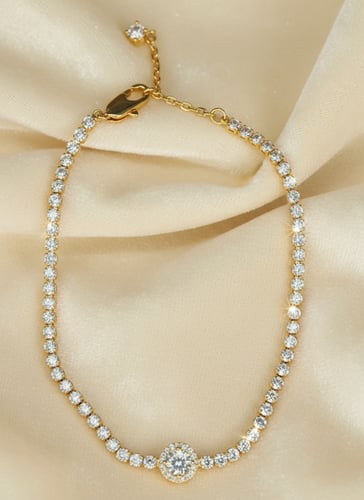 سوار ذهبي فاخر بقلادة دائرية مرصعة بالزركون – أناق...